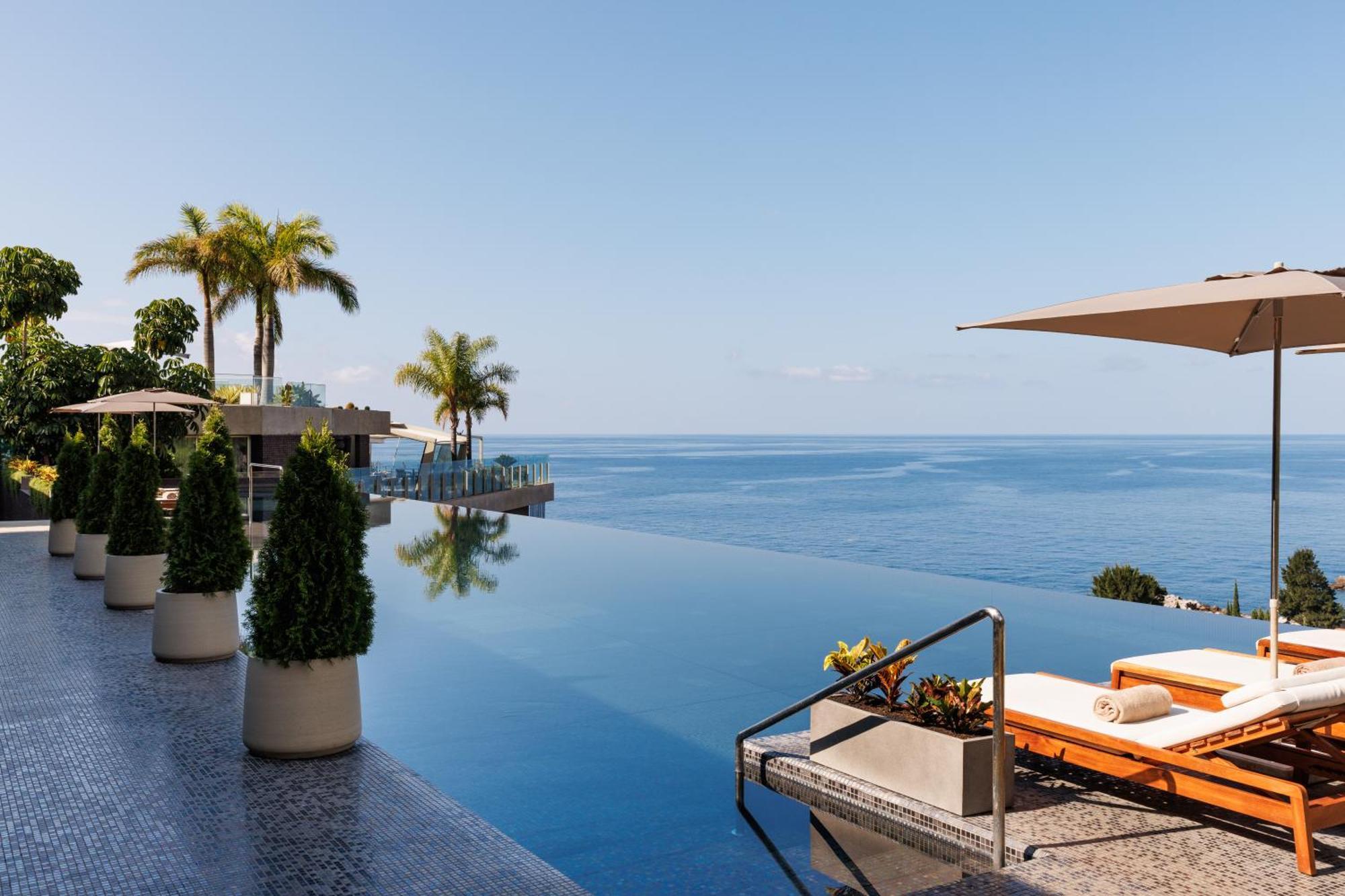 Saccharum - Resort And Spa - Savoy Signature Calheta  Exterior photo Infinity pool at the hotel